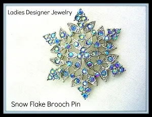 snowflakebrooch_vintagesnowflakepin_snowflakerhinestonebrooch_ladiesdesignerjewelry_wintersnowflakebrooches_holidaybroochpin_estatejewelrypin
