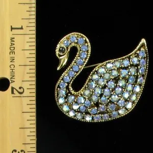 vintageswanpin_rhinestonevintageswanpin_bluerhinestoneswanpin_goldswanpin_vintagegoldswanpin_ladiesdesignerjewelry_swanbroochesvintage_pinsswans